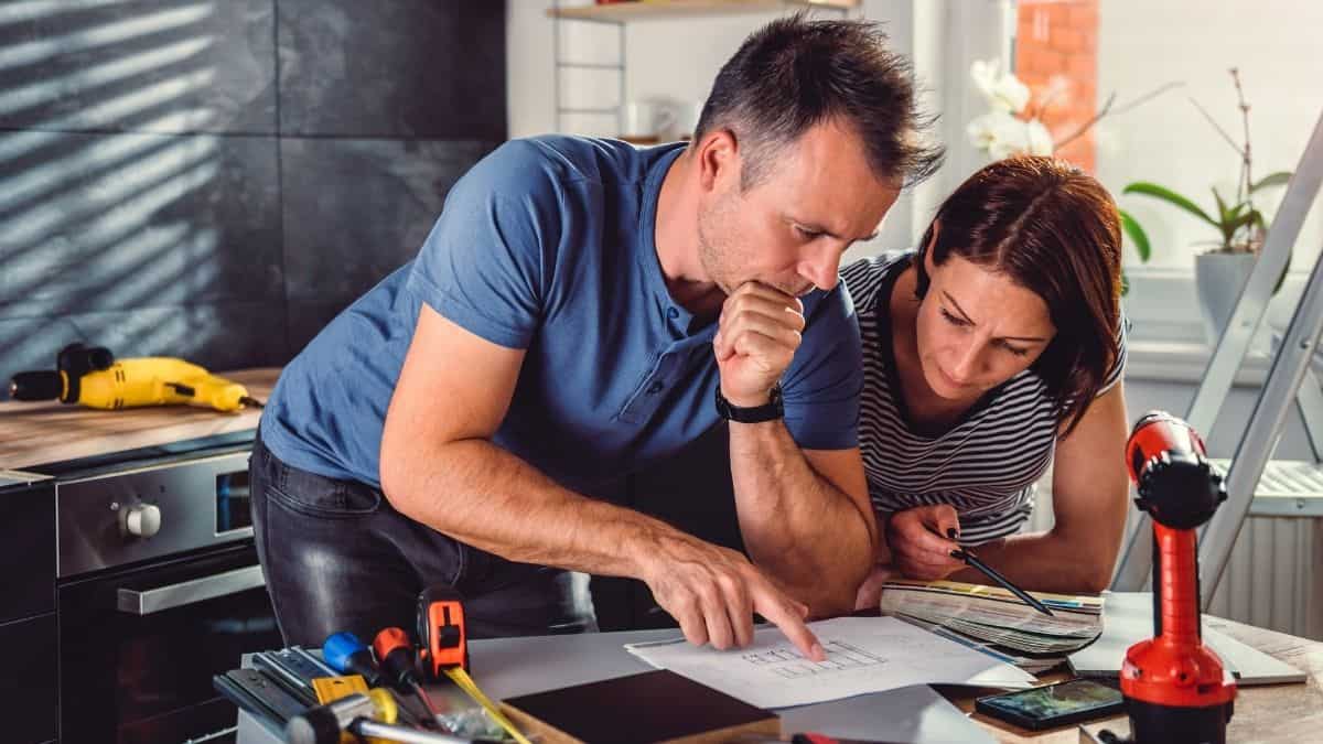 couple reviewing home renovations
